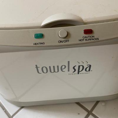 Brookstone Towel Spa ( Heats your towels!)