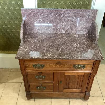 Eastlake Victorian washstand with rose marble backsplash and top