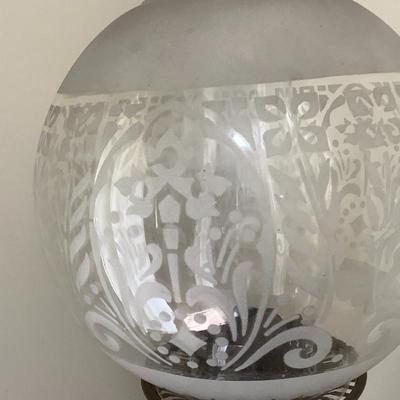 With etched glass globe