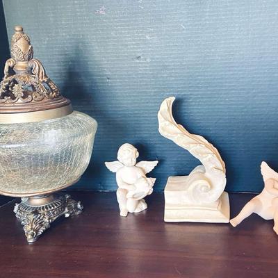 Crackle Glass Centerpiece And Ceramic Shell Cherubs. 