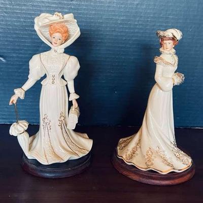 Lenox Porcelain Figurines-“Lady Shopping On 5th Ave “ And “Lady Of Fashion Grand Voyage
