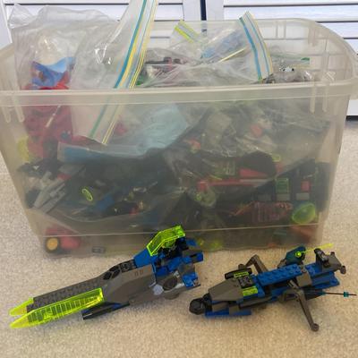 Plastic Bin Full Of Legos 