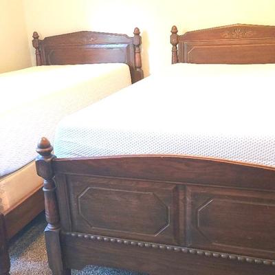 Pair of Early 1900's Davis Cabinet Co Twin Bed Frames, Includes Like-New Mattresses 