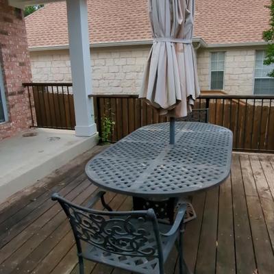 Heavy Metal Outdoor Table (made for umbrella), ^7 Ft x 42.5" Wide x 28" H, & 2 Chairs