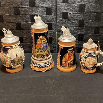 4 Beer Steins - Music Box (tallest One), 1 Made In Germany, 1 Marked “foreign”, 1 Unmarked