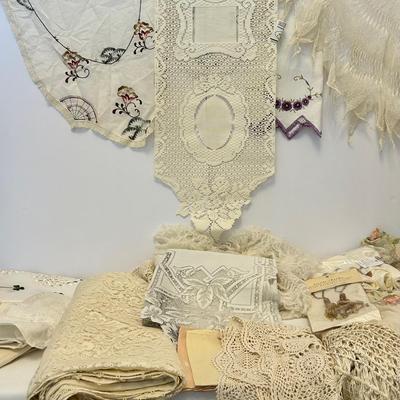 A Wide Assortment Of Embroadered, Laced, And Crocheted Table Wear
