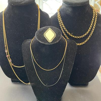 4 Chains And A Pendant