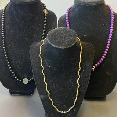3 Necklaces: Purple, Black & Metallic