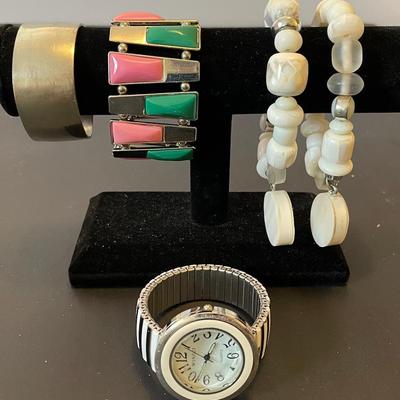 4 Bracelets And 1 Watch