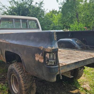 84’ White Square body Chevy truck, 4-wheel Drive. 