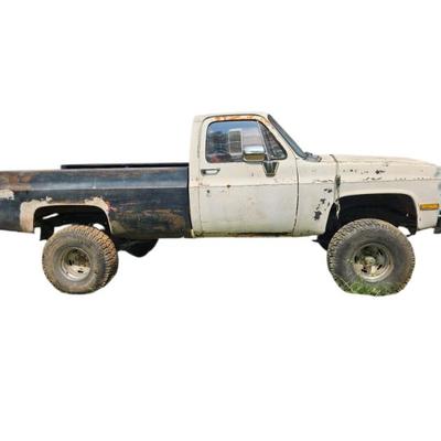 84’ White Square body Chevy truck, 4-wheel Drive. 