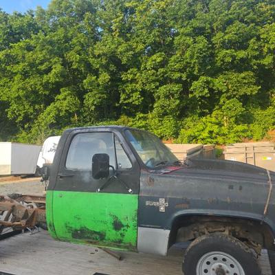 84’ Square body cab and chassis parts truck. 