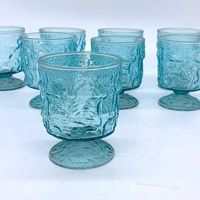 Set/8 Vtg. Anchor Hocking Lido Milano Aquamarine footed rocks/ juice glasses.