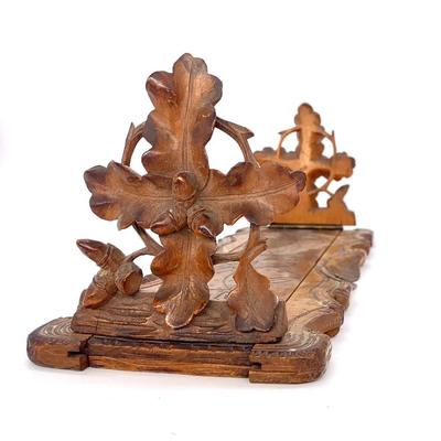 Antique carved walnut Black Forest expandable bookends, excellent condition.