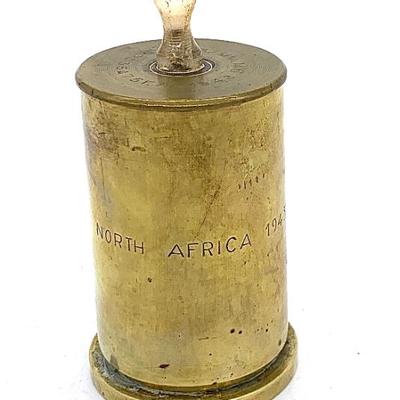 WW II brass shell inscribed “ North Africa 1943-44