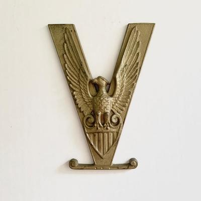 This gold painted cast V emblem w/ eagle is 6”, probably obtained shorty after WWII to commemorate the victory.
