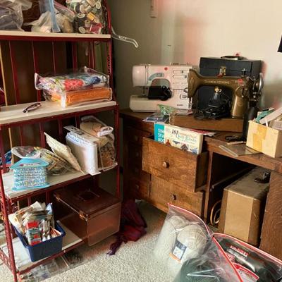 Sale Photo Thumbnail #23: Sewing notions and machines.  We also have multiple antique sewing machine stands.  And the display rack is for sale!!