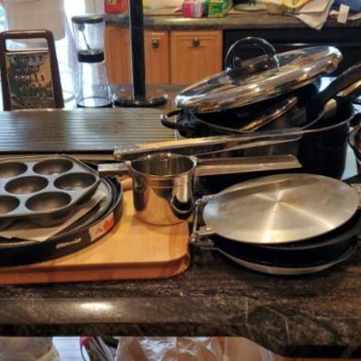 Pc218 pots pans, muffin tin, garlic press, cutting board