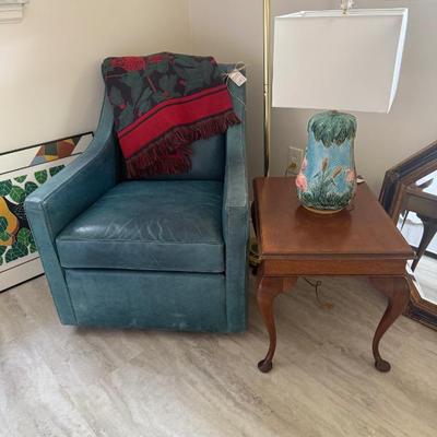 Turquoise leather swivel chair, side table