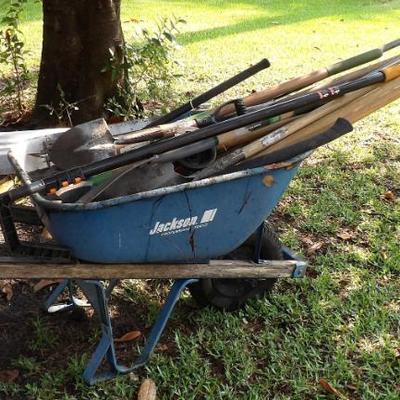 Wheel Barrell With yard tools 
