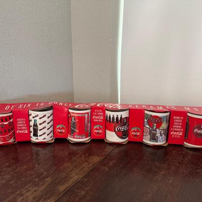 Six Ceramic Coke Mugs