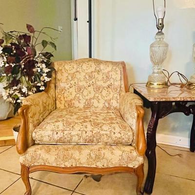 Mid-century floral upholstered chair
Wood & Granite Side Table 
Set of Brass & Cut Glass Table Lamps