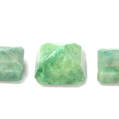Lot 178 group of three light green gemstones