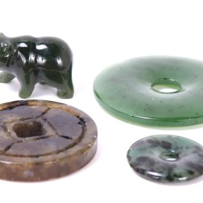 Lot 108 group of four chinese jade pieces