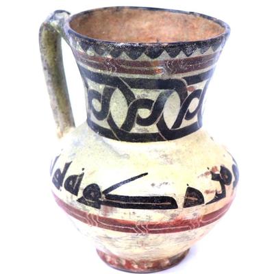 Lot 312 finely made kufic inscribed jug 9th 10th century
