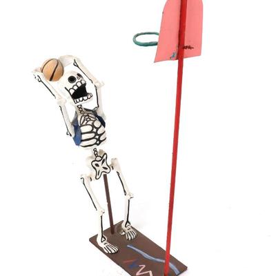 Lot 236 paper mache death playing basketball