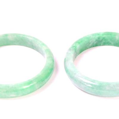 Lot 174 lovely pair of light green jade bangle bracelets