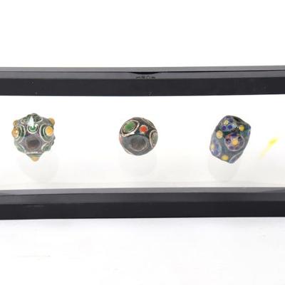 Lot 187 trio of chinese glazed beads