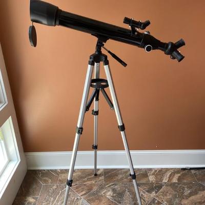 Telescope with carrying case and manual