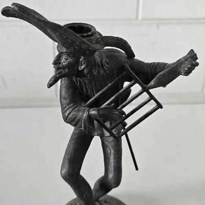 Vintage Man Dancing Playing an Instrument Candlestick