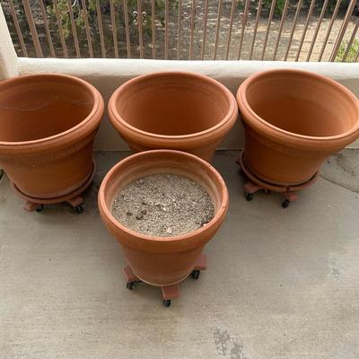 Set of 4 Large Terracotta Garden Pots with Rolling Caddies