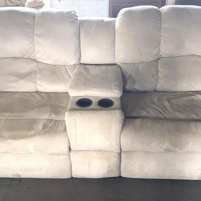 Tan  Electric Reclining Sofa with storage unit and two cupholders