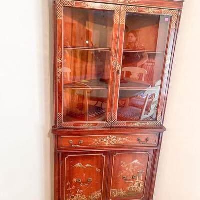 Asian- inspired hand painting corner cabinet 	69h” x 33w”?