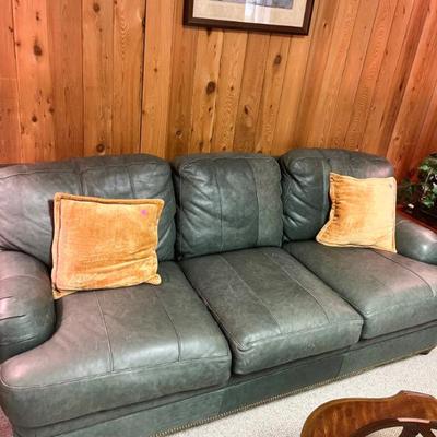Green leather Couch by Hancock & Moore	32”h x 82”w 38”d