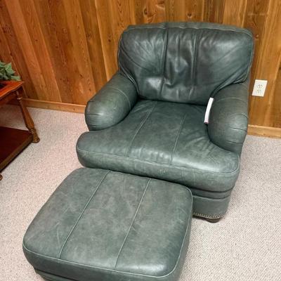 Green leather armchair with matching ottoman by Hancock & Moore	"Chair:32”h x 35”w 41”d
Ottoman: 16”h x 25”w x 19”d"