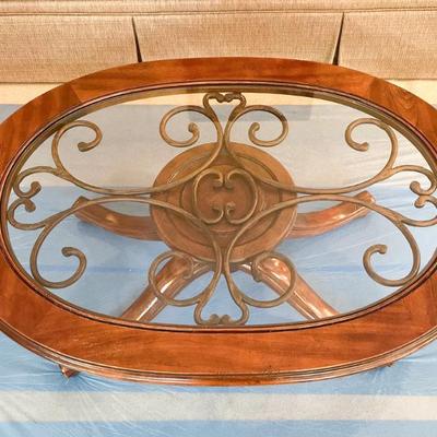 Glass top metal accent coffee table	16”h x 43”w x 32”d