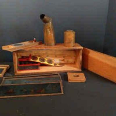 Antique magic lantern with glass slides
