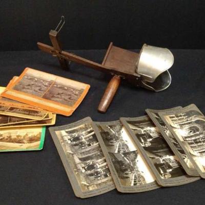 Antique stereoscope with card collection