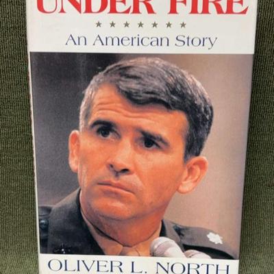 Signed under fire an american story" by oliver north