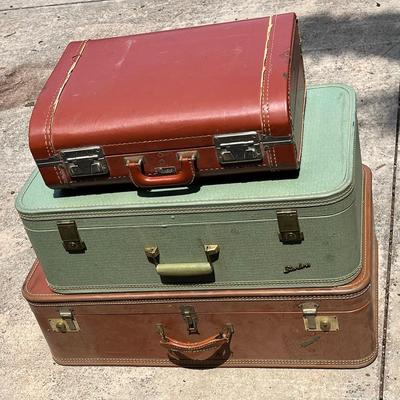 Three Old Suitcases