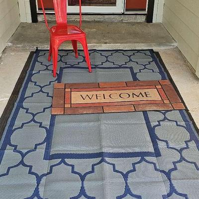 Rug , Welcome Mat And Red Chair 