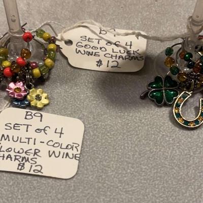 Two Sets Of Four Wine Charms