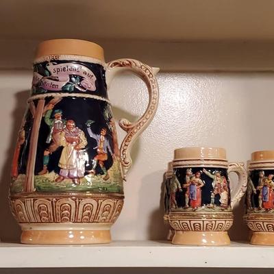(2) German Steins And (6) Mugs