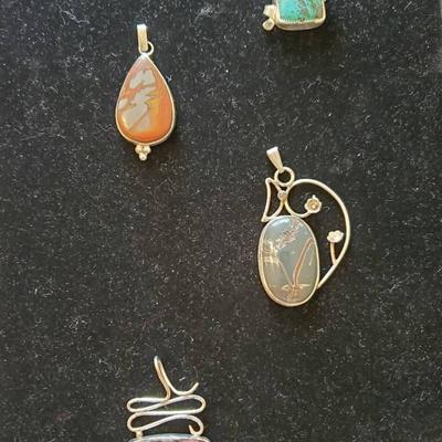 (4) Sterling Silver Pendants 