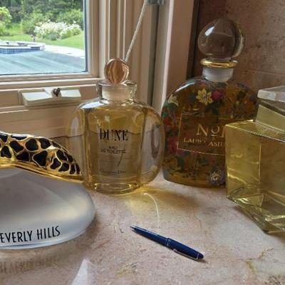 Massive perfume and cologne bottles