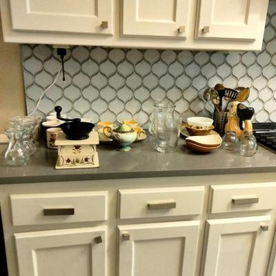 Vintage serving pieces, teacups, vases, and mugs